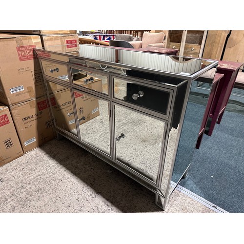 3115 - A mirrored three drawer three door sideboard (crack on doors)