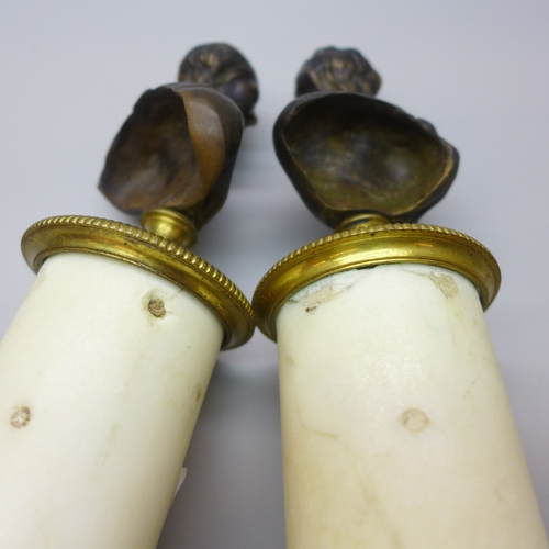 2010 - A pair of early 20th century bronze busts on brass mounted alabaster columns, 17.5cm