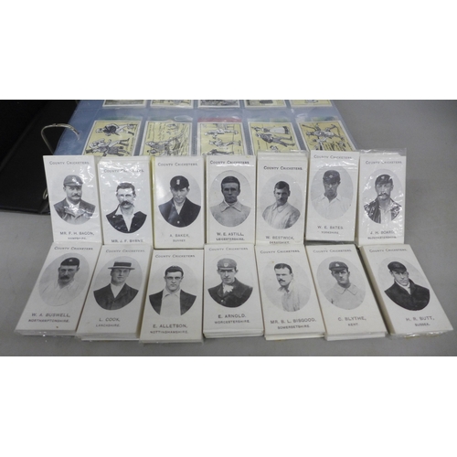 2016 - A collection of forty-five complete reproductions of early 1900s cigarette card sets in two albums a... 