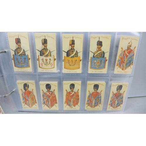 2016 - A collection of forty-five complete reproductions of early 1900s cigarette card sets in two albums a... 