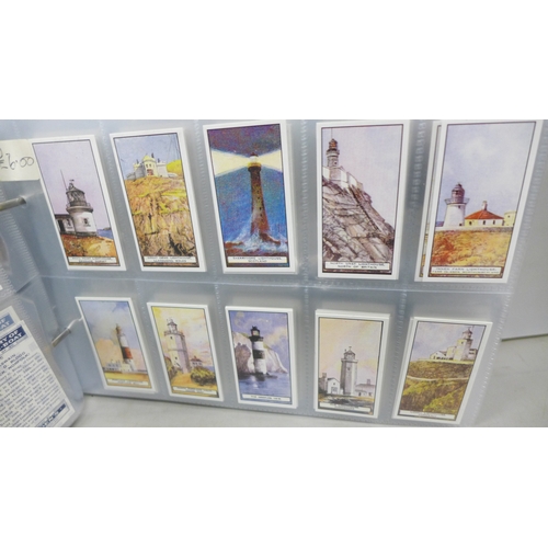 2016 - A collection of forty-five complete reproductions of early 1900s cigarette card sets in two albums a... 