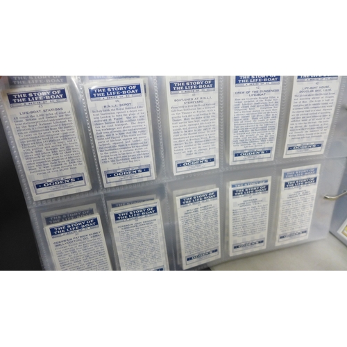 2016 - A collection of forty-five complete reproductions of early 1900s cigarette card sets in two albums a... 