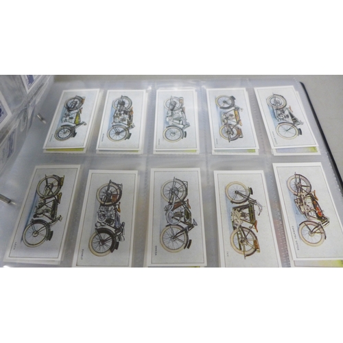 2016 - A collection of forty-five complete reproductions of early 1900s cigarette card sets in two albums a... 