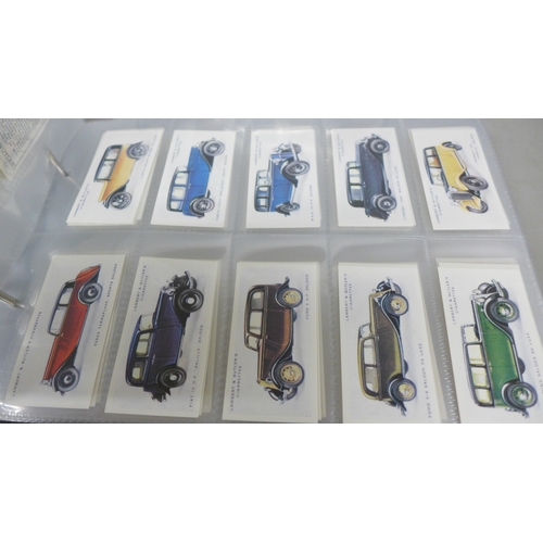 2016 - A collection of forty-five complete reproductions of early 1900s cigarette card sets in two albums a... 