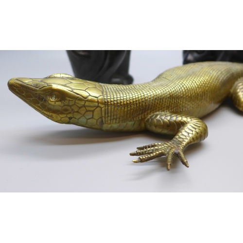 2022 - A brass model of a lizard, a bronze figure of a cat sitting and one other figure of a cat, (cat sitt... 