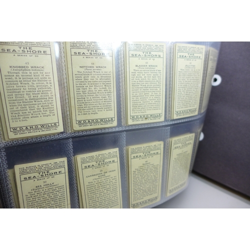 2043 - Cigarette cards; an album containing ten complete sets of Will's cigarette cards, includes Associati... 