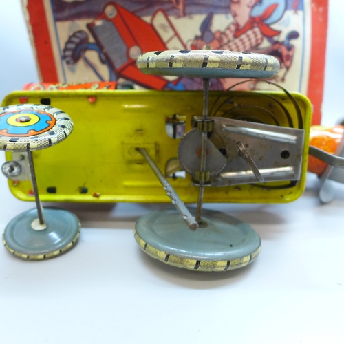2049 - A vintage tin-plate toy, Yipee-I-Aaay, Rodeo Jo, made in England, box a/f