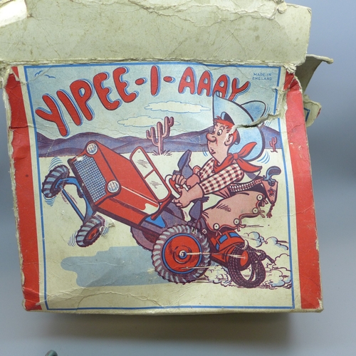 2049 - A vintage tin-plate toy, Yipee-I-Aaay, Rodeo Jo, made in England, box a/f