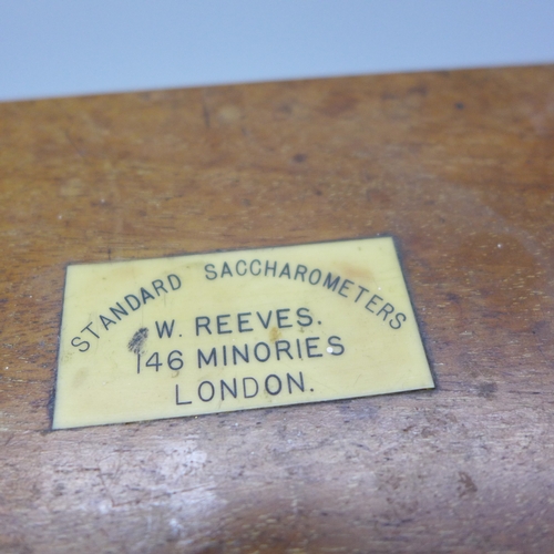 2059 - A boxed Standard Saccharometer, other hydrometers and a brass barrel tap