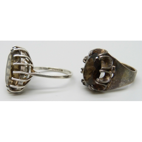 7117 - Two hallmarked silver and smoky quartz rings, 8g, larger stone example size P, the other size K