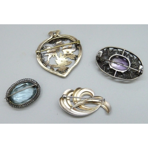 7132 - Two silver brooches, an Andreas Daub German silver brooch, 19g total, and an unmarked paste stone br... 