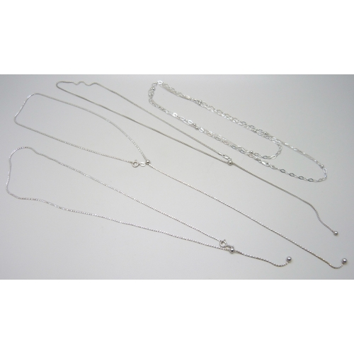 7152 - A collection of four silver chains, 22g