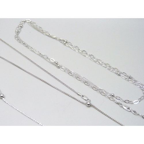 7152 - A collection of four silver chains, 22g