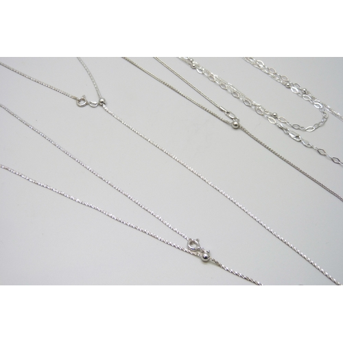 7152 - A collection of four silver chains, 22g