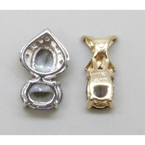 7136 - Two 9ct gold necklace pendants, 2.1g, largest 1.3cm