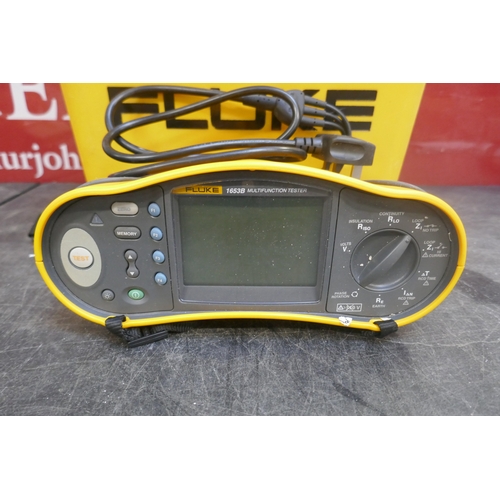 A cased fluke 1653B multi-function tester and assorted testing ...