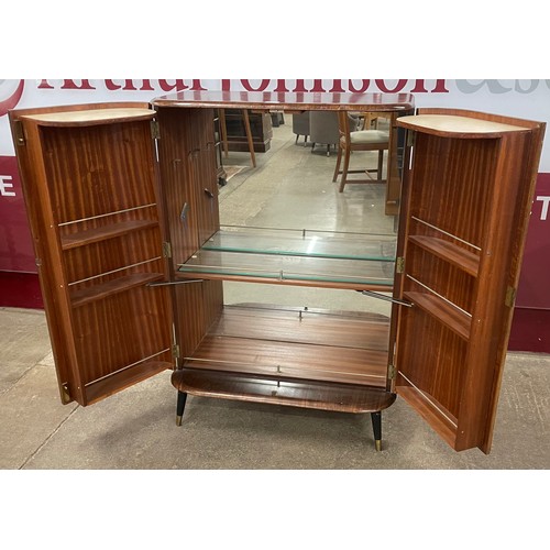 101 - A tola wood fitted cocktail cabinet