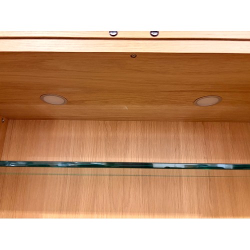 3069 - An oak glass door display unit with integrated LED lights