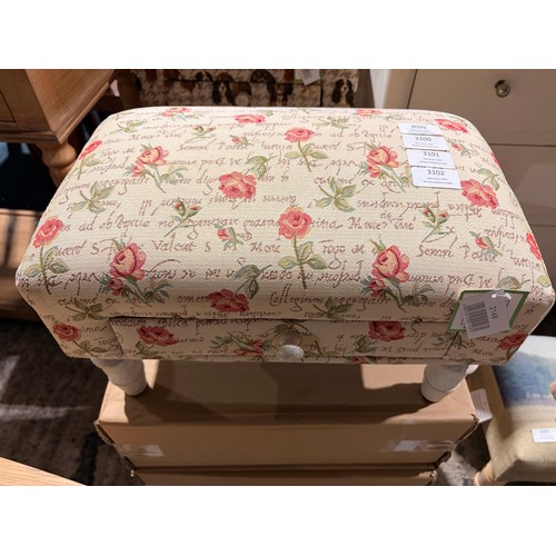 3099 - A small floral patterned footstool with a drawer (unchecked)