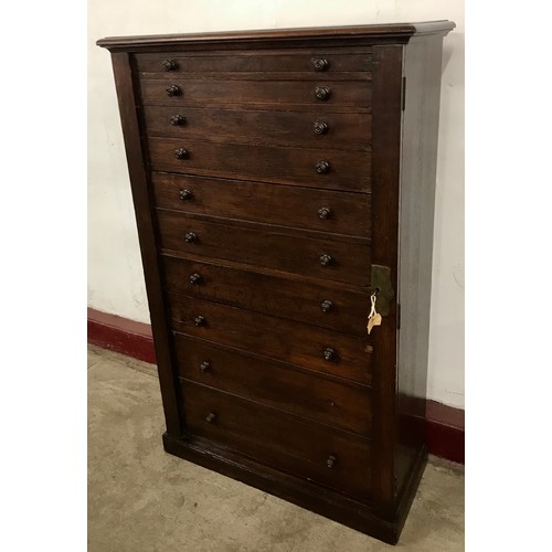 110 - A Victorian oak secretaire Wellington chest