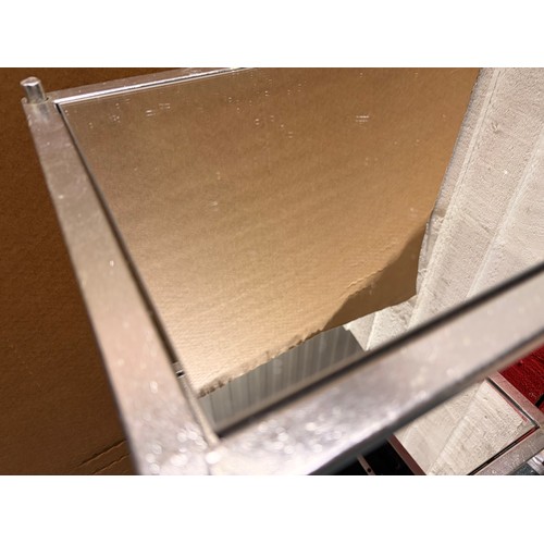 3110 - A silver effect mirrored three tier shelf unit (unchecked)