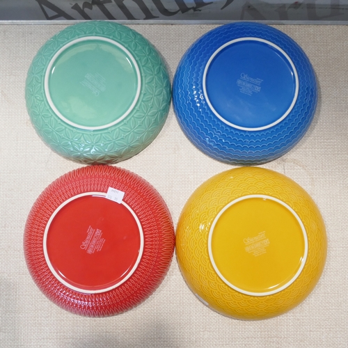 6020 - A four piece colourful stoneware serve bowls set (Crack to blue bowl)  (376-55) *This lot is subject... 
