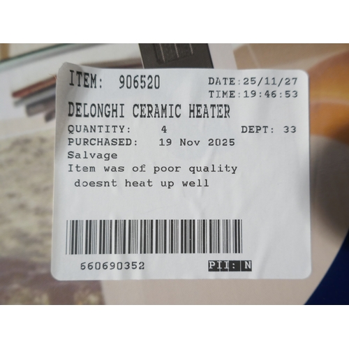 6057 - A Delonghi ceramic fan heater (376-400) *This lot is subject to VAT