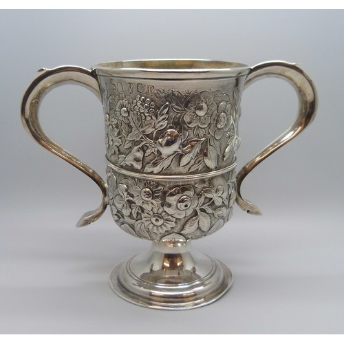 7001 - A George III silver two handled loving cup with embossed floral decoration, J Robertson & D Darling,... 