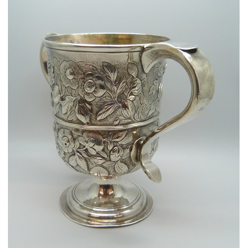 7001 - A George III silver two handled loving cup with embossed floral decoration, J Robertson & D Darling,... 
