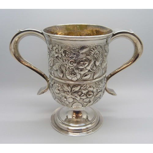 7001 - A George III silver two handled loving cup with embossed floral decoration, J Robertson & D Darling,... 