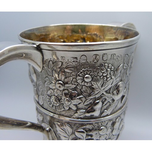 7001 - A George III silver two handled loving cup with embossed floral decoration, J Robertson & D Darling,... 