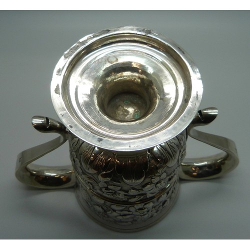 7001 - A George III silver two handled loving cup with embossed floral decoration, J Robertson & D Darling,... 