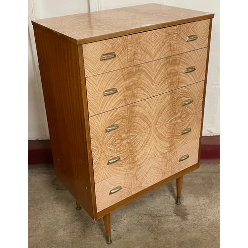 97 - A teak and walnut effect chest of drawers
