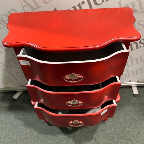 3050 - A red French style three drawer cabinet