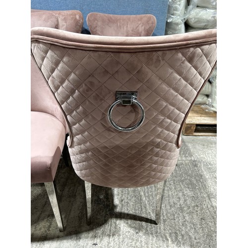 3067 - A set of four pink velvet Luna dining chairs  * This lot is subject to VAT
