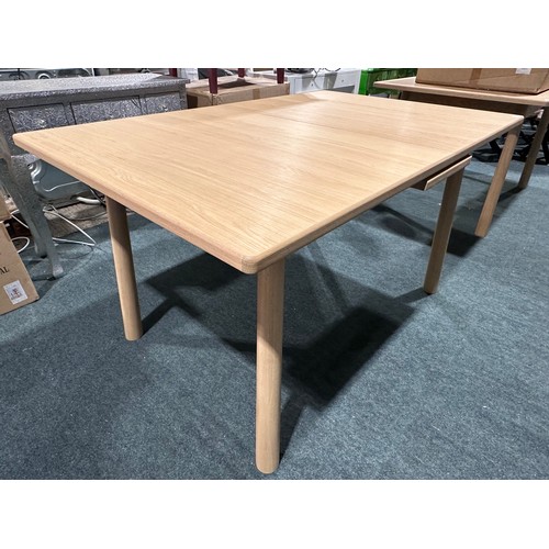 3074 - An Andersson Bianco oak extending dining table