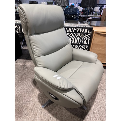 3083 - A grey leather swivel/ manual reclining chair with footstool