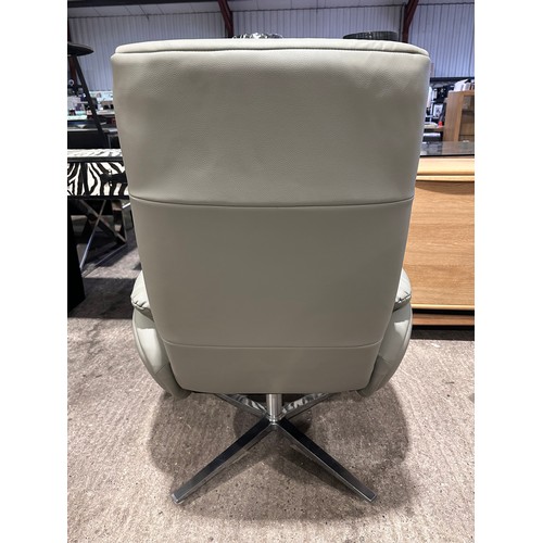 3083 - A grey leather swivel/ manual reclining chair with footstool