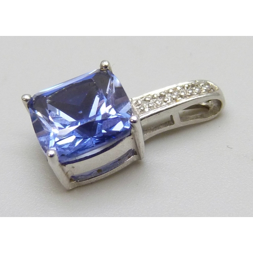 7114 - A 9ct gold, sapphire (possibly synthetic) and diamond pendant, 1.2g, 1.5cm including bail