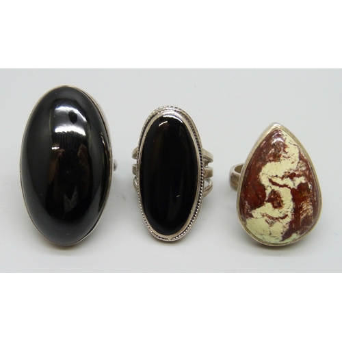 7119 - Three silver rings including onyx, 37g, largest stone 3.5cm