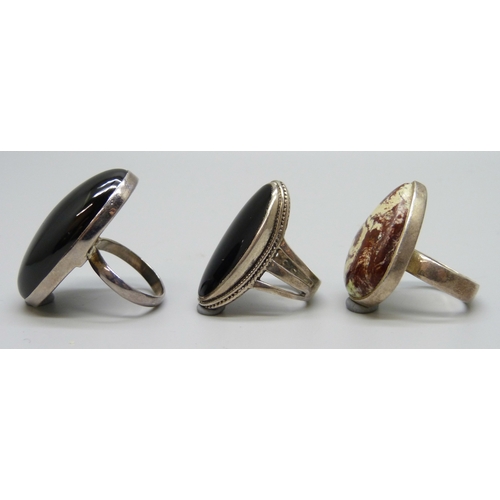 7119 - Three silver rings including onyx, 37g, largest stone 3.5cm