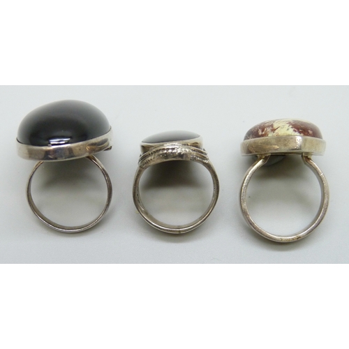 7119 - Three silver rings including onyx, 37g, largest stone 3.5cm
