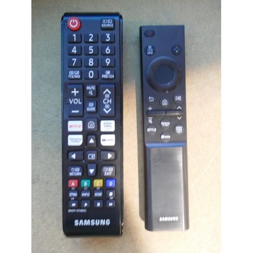 6220 - A Samsung 75” Crystal UHD 4K television with remotes - model no - UE65AU9000KXXU (damage to corner/l... 