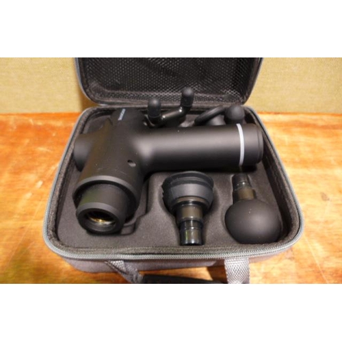 6214 - A Silvercrest massage gun (377-479) *This lot is subject to VAT