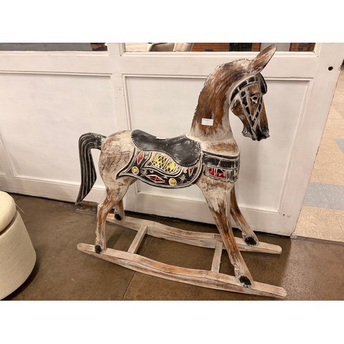 3258 - A wooden decorative rocking horse
