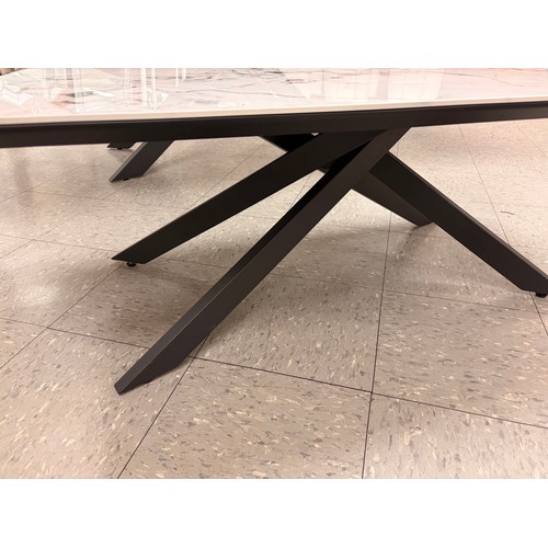3275 - An Aura ceramic coffee table with iron legs * This lot is subject to VAT