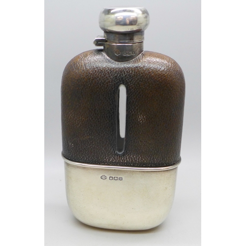 7381 - A George V silver and leather covered hip flask, cup 65g, William Hutton & Sons Ltd, Sheffield, 1926