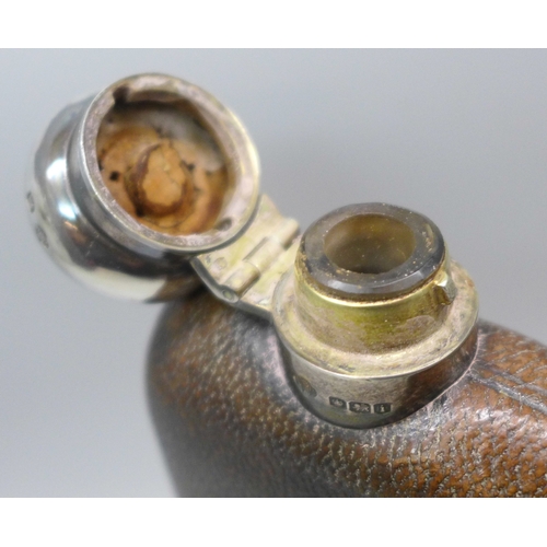 7381 - A George V silver and leather covered hip flask, cup 65g, William Hutton & Sons Ltd, Sheffield, 1926