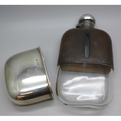 7381 - A George V silver and leather covered hip flask, cup 65g, William Hutton & Sons Ltd, Sheffield, 1926