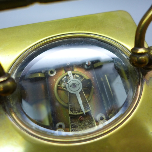 A brass and glass carriage clock, the dial marked ‘Furber & Son ...